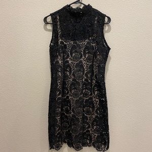Black lace dress with champagne slip by Gracia